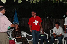 Victor celebrating his graduation with a Swiss T-shirt