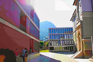 The 'red building' (left) behind the main building (right)